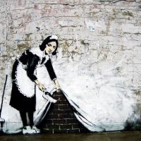 Banksy onder het tapijt