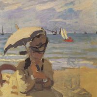 Camille Monet op het strand van Trouville door Monet