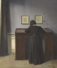 책상에 서 있는 Hammershoi Vilhelm Ida 1900