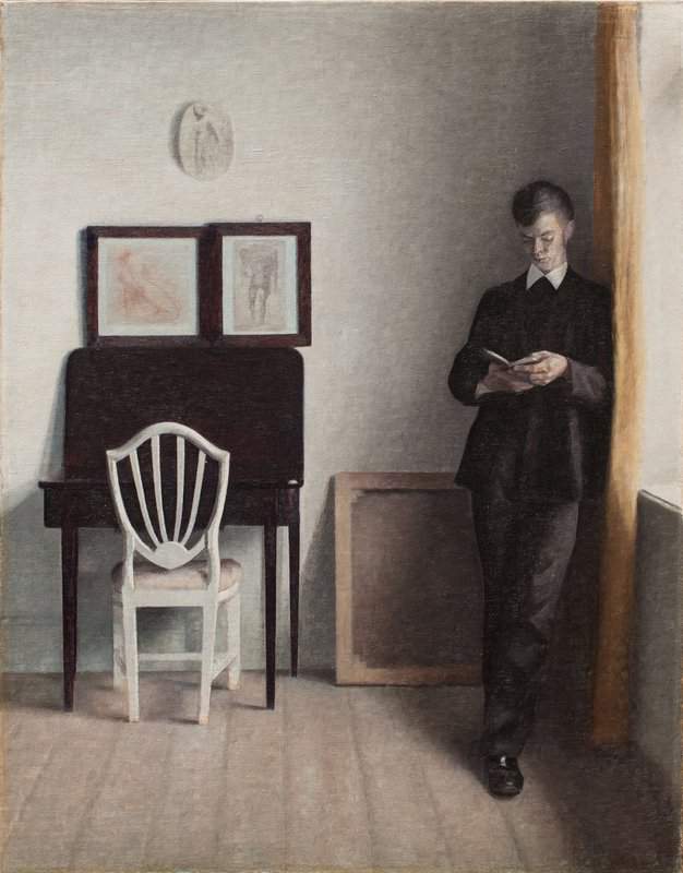 Hammershoi Vilhelm Interior With Young Man Reading canvas print