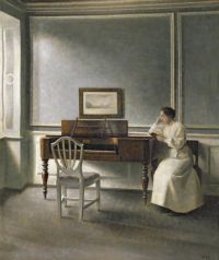 Hammershoi Vilhelm Frau liest an einem Klavier 1907