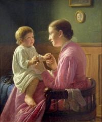 هانسن كونستانتين الابنة الكبرى للفنانة مع أختها الصغيرة في حضنها