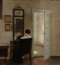 Holsoe Carl EINE Dame, die vor einem Spiegel in einem Innenraum sitzt