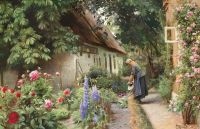 Monsted Peder An Old Woman Watering The Flowers Behind A Thatched Farmhouse 1928 canvas print