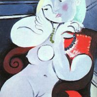 Picasso mujer desnuda sentada en un sillón rojo