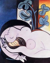 Picasso nackt in einem schwarzen Sessel