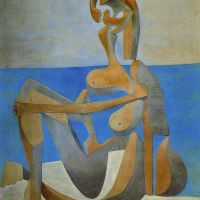Bañista sentado Picasso en la playa