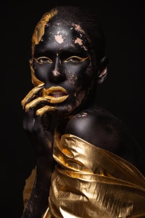 Ethereal Elegance: The Dance of Shadows and Gold wall art