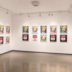 Collection of authentic Andy Warhol prints including Marilyn Monroe and Campbell Soup Cans displayed in Poppins Shop gallery