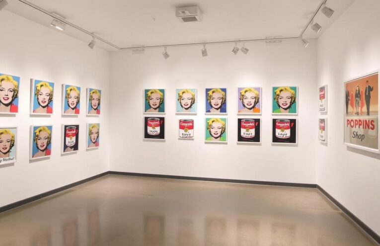 Collection of authentic Andy Warhol prints including Marilyn Monroe and Campbell Soup Cans displayed in Poppins Shop gallery