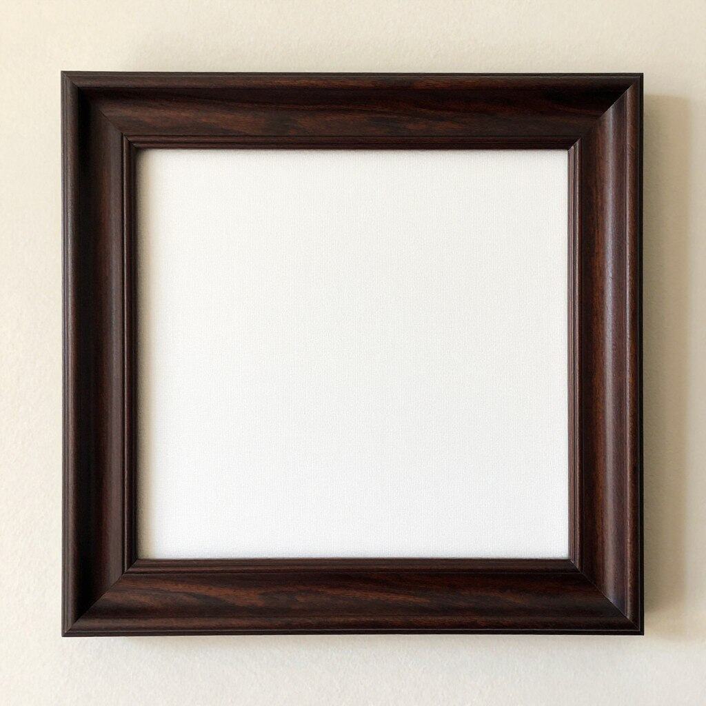 Transform Your Memories Into Stunning Canvas Prints 9 Canvas print with decorative wooden frame in dark finish